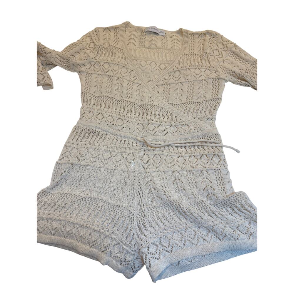 Crochet knit romper 
M Cross v neck front, bell sleeves. Super comfy and cute